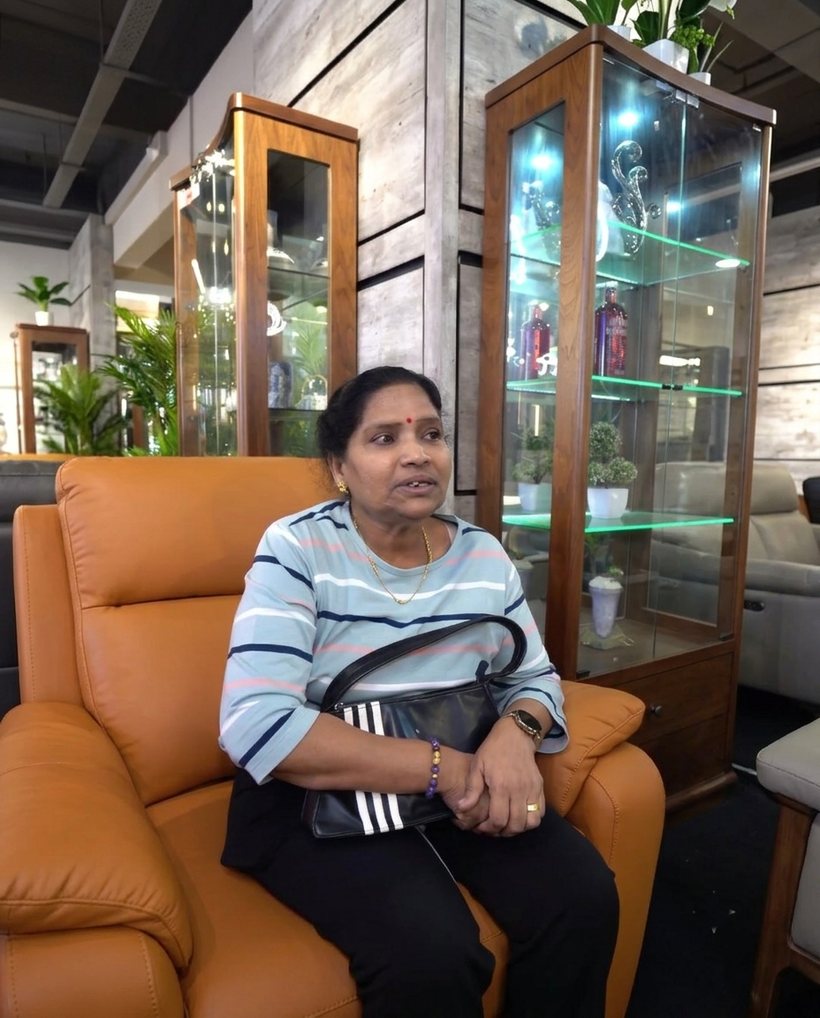 Happy customer at the Furniture Depot showroom