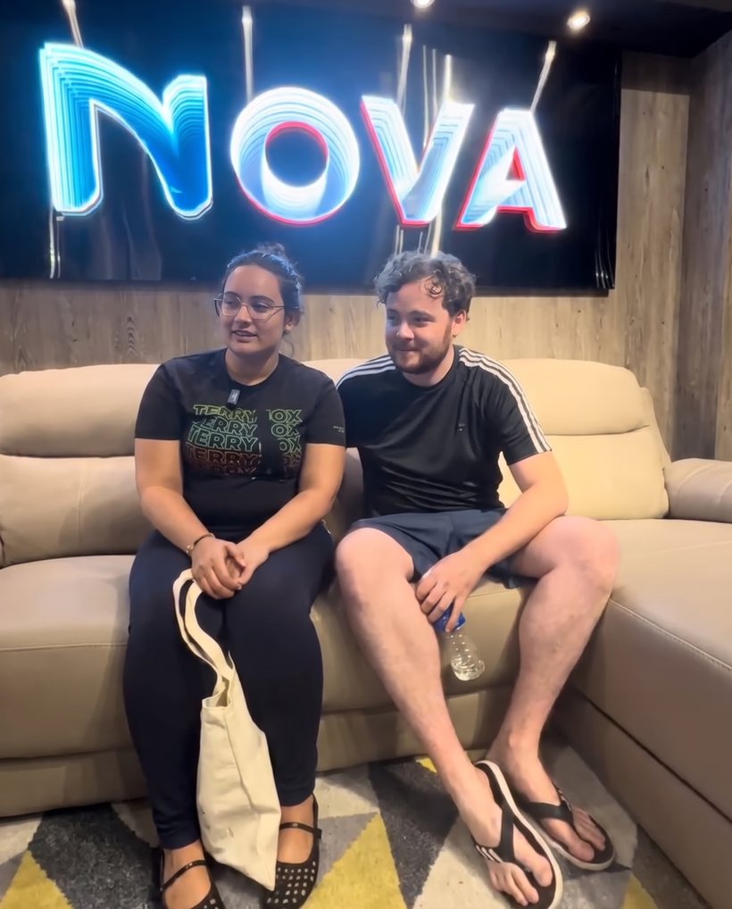Happy customers at the Furniture Depot showroom